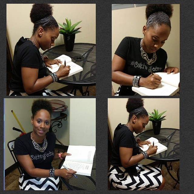 Manor signing book copies. Check out that "Catching Feelings" Tee!